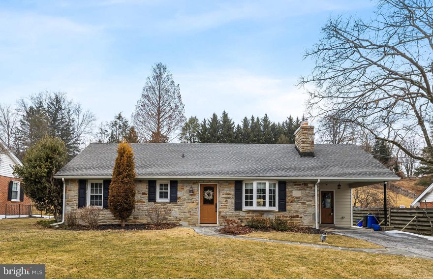 This beautifully updated 3-bedroom, 2-bath home blends timeless character with modern comfort. The inviting Living and Dining Rooms feature gleaming hardwood floors and are centered around a cozy wood-burning fireplace.  The Owners just Replaced the Front roof in February and recrowned both Chimneys..this home is  Move-In Ready!
The redesigned Kitchen is a true highlight, showcasing white cabinetry, granite countertops, a walk-in pantry, and a spacious island—perfect for serving meals or entertaining. The Kitchen opens seamlessly to the Family Room, which offers a second wood-burning fireplace, built-in bookcases, and custom seating benches. A large picture window overlooks the private backyard and sparkling pool area.
The newly added Mudroom provides the ideal everyday entry, complete with custom built-in seating and storage benches, a shelved closet, and a pocket door leading to the new Laundry Room.
There is a full basement under the original house.  It has the plumbing for a half bath that these owners took out but left available.  There is plenty of room for work out space/work bench/storage and has a walk out set of stairs.
The Primary Bedroom features two double closets and sliding glass doors that open to the backyard. The en-suite Bath includes a granite-topped double vanity and a large glass-enclosed shower. A second Bedroom on the main level has access to a full hall Bath. Upstairs, a spacious third Bedroom doubles as an office or flex space.
The fully fenced backyard is an outdoor retreat with a large in-ground pool and diving board. The recently rebuilt retaining wall wraps around the pool deck and patio, creating a beautiful, functional setting for relaxation and entertainment.