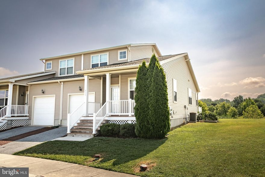 Your search can end here at a Duplex Home in Fruitland, MD! The First Floor welcomes you with the beautiful Oak Hardwood Flooring. Tons of natural light comes in from the windows that are facing south. Beautifully decorated/updated Kitchen with a Quartz countertop, and a modern kitchen faucet with oversized stainless sink. The kitchen comes with an Extra pantry cabinet for your essentials and two refrigerators! First floor bedroom adjoins with updated full bathroom. First floor bathroom is beautifully updated with tiles and quartz vanity top. As you go up to the second floor, there is an Attic for your storage, two bedrooms and updated tile bathroom. Pond view from the living room with sliding doors and it continues with a deck for your entertainment. Call today for your private showing!