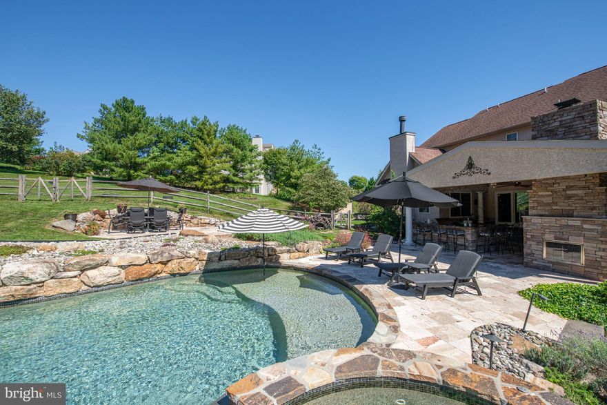 Step into a realm of unparalleled beauty and exquisite design with this remarkable SMART custom built home offering nearly 6100 SF of Living Space with a 3-Car Garage and no HOA fees. This captivating home defies convention, boasting a dazzling array of features that elevate it above the ordinary. This home sweet home is ANYTHING but "cookie cutter." From the moment you enter, you'll be greeted by an abundance of natural light dancing across the spacious rooms, accentuating the chic and modern palette that graces every corner. Take in the panoramic views from the gourmet kitchen, where every meal becomes a culinary masterpiece against the backdrop of open sceneries of the outdoor living space with pool. With 5/6 bedrooms, 6 baths, rooms sprawled across a generous 6100 square feet, this home offers ample space for luxurious living. Discover the convenience of the In-Law/Au-Pair suite, ensuring comfort and privacy for all. Indulge in the epitome of culinary excellence with top-of-the-line Viking appliances, while the presence of main floor laundry ensures effortless laundry days. A meticulously crafted floor plan invites you to explore every corner, with the grand open foyer, 2 wood burning fireplaces add to the serene first floor while a third, 3 sided gas fireplace is located in the primary retreat with an AMAZING Bath and separate custom Walk-In Closets that could house most families. Additional bedrooms are all well-appointed with more custom ample closet space and private baths. The finished walk out basement offers a full state of the art gym, in-law- suite with full bath and versatile space ready to adapt to your every whim, whether it be a home theater, game room, or creative sanctuary with a extra plumbed bathroom, wet bar and kitchen. Outside, a fenced in pool area with full electric fencing in back, side and front yards, with stunning landscaping that sets the stage for unforgettable gatherings and tranquil moments soaking up the sun in the in-ground pool. Enjoy breathtaking sunsets from the heated covered patio or gather around the 4th 3 sided fireplace for cozy conversations under the stars or side  veranda. With a new roof, new 2 out of 3 zoned HVAC with scent diffusers adds to the long list of many recent upgrades, this home is not just a residence but a testament to refined living. Nestled on a cul-de-sac within a quaint community, it offers the perfect blend of serenity and convenience, ensuring that every day is filled with moments to cherish. The tranquil location is surrounded by state parks, golf courses, and numerous local shopping centers. King of Prussia and the Philadelphia International airport are within easy reach, and New York City is just two hours away.  Don't miss your chance to make this extraordinary property yours! Schedule your showing TODAY!