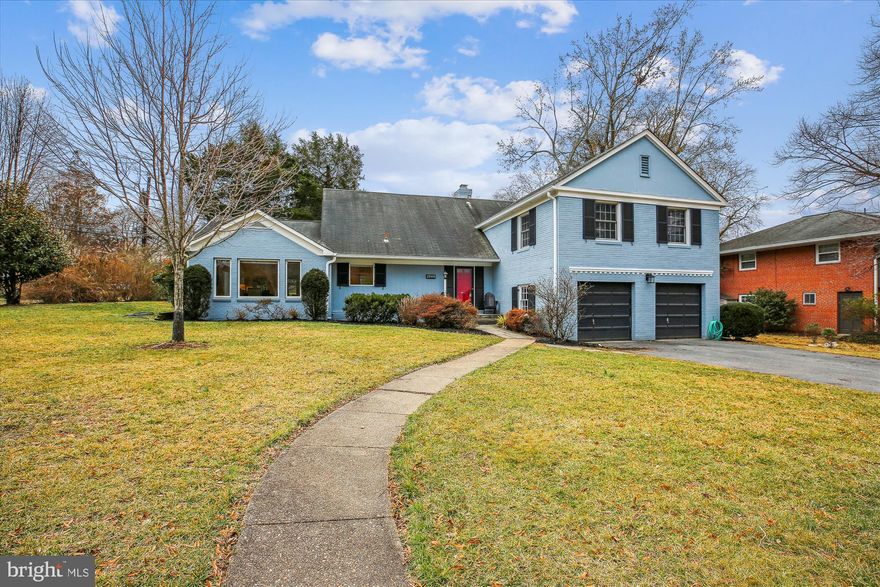 Beautifully appointed and thoughtfully redesigned, this home sits on a 12,343-square-foot corner lot in the highly sought-after neighborhood of Kenwood Park. This updated and spacious property offers four bedrooms, three updated full bathrooms, two powder rooms, and approximately 3,700 square feet of living space across 4.5 finished levels. Exquisite craftsmanship is evident throughout, with handsome hardwood floors, elegant moldings, custom built-ins, modern ceiling fans, and tasteful architectural details. Ample closet space, complete with organizing systems, enhances the home’s functionality and appeal.

The main level welcomes you with a gracious foyer, an expansive living room with a fireplace, and a renovated open-concept chef’s kitchen. The light-filled kitchen is equipped with granite countertops, rich wood cabinetry, a stainless-steel appliance suite, a Thermador gas cooktop with a retractable exhaust fan, and an island/breakfast bar that offers plentiful storage space. Additional features include a coffee station, two pantries, and abundant prep space. This space flows seamlessly into the expansive, sun-drenched great room — the heart of the home — featuring a vaulted ceiling and direct access to the backyard. A powder room, a secure walk-in storage closet and a convenient laundry room complete this level.

The second level features three bedrooms with custom closet systems and two full bathrooms. The gracious primary suite offers two closets, display shelving, and a private updated bathroom. A short flight of stairs leads to the third level, which includes an additional en-suite bedroom with a private bath and an attached office or flex space.  There is a large unfinished attic space above this level with the potential to add additional office/work-out space or bedrooms.

The first lower level is bright and inviting, with a family room featuring recessed lighting, custom built-ins, a large closet, and walkout access to the picturesque patio and backyard. This floor also includes a powder room and direct entry to the two-car garage. The basement provides a spacious recreation room with tile flooring and overhead lighting, offering an ideal space for a pool or ping pong table.

The yard is equipped with a Montgomery County incentivized rain garden designed to intercept, store and soak in rainwater to provide valuable habitat for pollinators and blooms with a beautiful explosion of color every spring.  In addition to hosting over 30 flowering native plants, the garden features river stones and berms that carry stormwater runoff to the street and away from the yard and patio. 

Situated on a tranquil and quiet corner lot with mature landscaping, this home combines beauty and functionality. Located near vibrant Downtown Bethesda, exceptional dining, and convenient public transportation, it offers unparalleled convenience with easy access to Bradley Boulevard, River Road, Chevy Chase, Westbard and I-495 . This property is a true gem in one of the area's most desirable neighborhoods.

Schools: Walt Whitman High School, Pyle Middle School, and Bradley Hills Elementary.