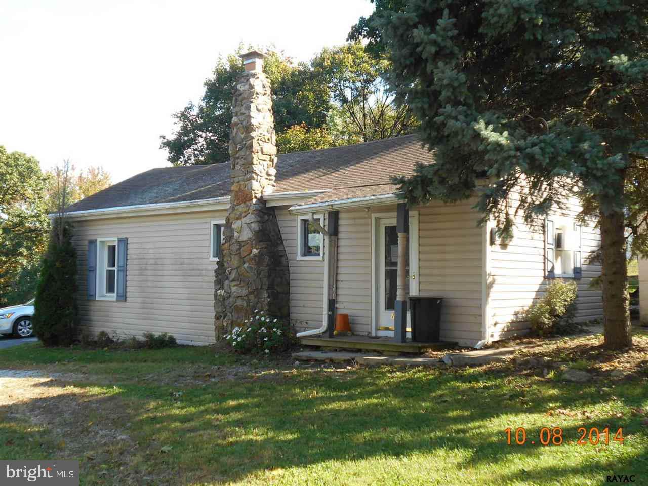 HANSEL AND GRETEL WOULD LOVE THIS CHARMING LITTLE COTTAGE WITH A STONE FIREPLACE IN THE LIVING ROOM, EAT-IN KITCHEN, 2 BEDROOMS, A PAVER PATIO, AND A NICE YARD FOR ENJOYING NATURE.