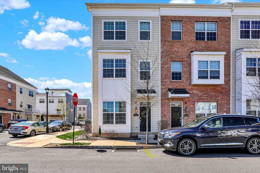 Welcome to 122 Easton St., a beautiful townhouse located in the Waterside community in Bensalem. This Alexandria model, end-unit townhouse was built in 2020 and offers multiple levels of living with a rear-entry, oversized 1 car garage that includes a new Level 2 Lectron EV charger (less than one year old - can be swapped out for NACS charger), and a lovely deck with river views off of the fourth level bedroom/loft. Upon entering this home, there is a den/office space on the first level, along with a sizable laundry room, featuring new, oversized washer and dryer (less than one year old) and a utility tub/sink. Entry to and from the garage is also on this level. Up the stairs to the second level is the expansive main living area that features a large, light kitchen with abundant counter and cabinet space, granite countertops and stainless steel appliances (less than five years old). There is also a large walk-in pantry in this kitchen area. Flowing from the kitchen is the sun-drenched dining area that connects to a spacious living room. Completing this level is a convenient powder room. On the third level, there is a primary bedroom with en-suite bathroom and walk-in closet, along with the second bedroom that also has a walk-in closet, as well as a hall bathroom. Up the stairs to the fourth level is a massive loft bedroom/recreation room, along with a full bath and walk-in closet. This space opens onto a deck that offers peaceful relaxation. This community offers walking paths along the river and is conveniently located to all means of transportation between Philadelphia and NYC. It is also convenient to abundant dining and shopping locations. Come see all that this lovely home has to offer!
