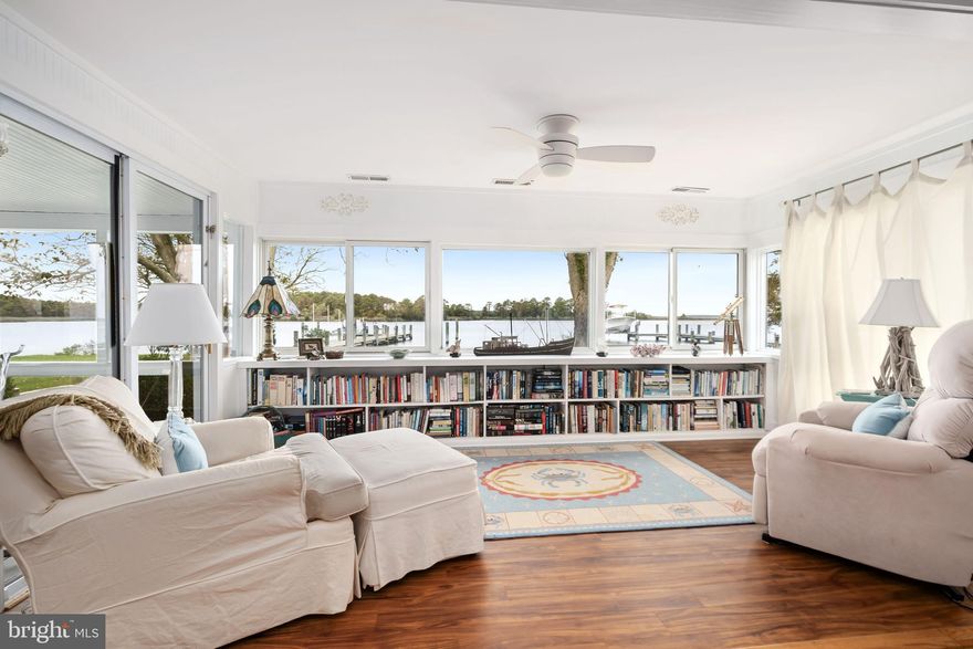 Prepare to fall in love! More than just a house- this is a home, lovingly cared for and thoughtfully designed. It offers the perfect blend of comfort, character and privacy. Experience the peace, and tranquility of this secluded, move-in-ready waterfront retreat. Ideally located, just a short distance from historic Cambridge, the Hyatt Regency Chesapeake Bay Golf Resort and within an easy reach of Easton, Oxford, and St. Michaels. Only minutes from Blackwater Wildlife Refuge, where you can explore the outdoors, spot eagles’ nests, or enjoy canoeing, biking, and hiking trails. Beautifully updated and meticulously maintained, this 3-bedroom, 2-bath home offers over 2,300 square feet of bright living space designed to capture the beauty of waterfront living. Panoramic water views greet you from nearly every room, with the living room showcasing breathtaking vistas of Fishing Creek. Two spacious living areas each with cozy fireplaces, make it easy to relax or entertain year-round. An open gourmet kitchen with custom finishes, and a built-in wine cooler make this an entertainer’s delight. The primary suite features its own private bath, while the open floor plan ensures comfort, functionality, and effortless flow.  Step outside to enjoy the ultimate outdoor lifestyle, watch ever ever changing  sunsets from the deck or porch, launch your boat from the private dock, or unwind beneath the shade of mature trees in the backyard. Whether sipping your favorite drink in a hammock or hosting social gatherings, this home is designed for relaxation, celebration and enjoyment of nature. A two-car garage adds convenience, while the setting itself delivers unmatched serenity. This Eastern Shore coastal haven is a perfect home, a vacation escape or a peaceful second residence away from the city. Experience the exceptional eastern shore lifestyle, relax, enjoy stunning sunsets and captivating waterfront scenery year-round. This can be yours! Roof replaced in 2018, HVAC 2022, New thermostat 2024, Irrigation 2025.  Encapsulated crawl space. Public Sewer.