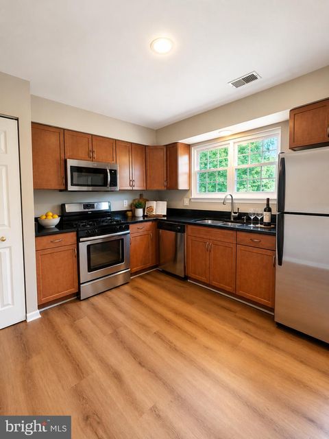 Photo of 14754 Basingstoke Loop, CENTREVILLE, VA 20120 (MLS # VAFX2318162)