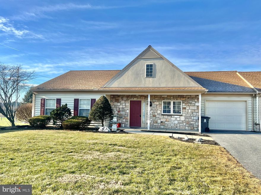 Welcome home to easy, elegant one-floor living in the desirable  Juniper Village 55+ retirement community in South Lebanon Township. This beautifully maintained 3-bedroom, 2 bath, 1,609 sq. ft. single-story home offers the perfect blend of comfort, convenience, and carefree living.  Step inside to find soaring 9-foot ceilings that create an open, airy feel throughout the main living spaces. The thoughtfully designed floor plan provides generous room sizes and effortless flow, ideal for both everyday living and entertaining. The kitchen features an abundance of countertop and cabinet space for a cook of any stature.  The living room overlooks the rolling hills of Lebanon County, and soaks in the afternoon sun.  The primary bedroom suite features a full bath, with a handicap accessible shower, and full walk-in closet.  The second bedroom is almost equally as spacious as the primary bedroom.  The third bedroom also makes for a peaceful sunroom off the back of the home, if a third bedroom is not needed!  Enjoy the convenience of first-floor laundry, making daily routines a breeze.  The home features gas heat for efficient comfort, and central air for those warm summer days.  The attached one-car garage offers secure parking and additional storage.  The home also has car driveway parking.  With all living spaces on one level, this home is perfect for those seeking low-maintenance, accessible living without sacrificing space or style.  Located within the peaceful and well-kept Juniper Village community, residents enjoy a welcoming neighborhood atmosphere designed for active adults. Don’t miss your opportunity to enjoy relaxed, maintenance-free living!  Call us today to schedule your private showing of the home!