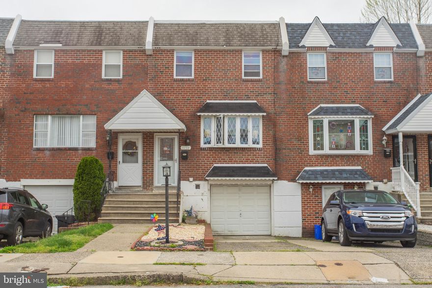Welcome to this exceptional 3 bedroom, 1 and a 1/2 bath townhome in a quiet pocket in Northeast Philadelphia's Parkwood neighborhood! Located on a street with little traffic, this home features central air for those hot summer days/nights and amenities a home buyer in today's market is searching for. Walk in to find a well maintained living room with beautiful flooring! Don't forget to pay attention to how much natural light the beautiful bay window offers! Follow the living room into the dining room to find an updated kitchen to include amenities such as a stainless steel refrigerator, custom wood cabinets, garbage disposal, dishwasher and plenty of countertop space. Be sure to notice the attention to detail and well maintained crown molding and millwork throughout the house! When you proceed to the second floor, you will notice 3 generous sized bedrooms, with hardwood flooring throughout, and a modernized full bathroom that you will fall in love with! You will also take notice to the amount of closet space each room has. Especially in the master bedroom! As you proceed to the basement, you will find a finished basement and plenty of storage space with a one car garage. Parking is not an issue on this street! The rear kitchen sliding glass door leads to a nicely landscaped rear yard with a deck can be used to host family and friends! The property is within close proximity to many schools, parks, supermarkets, and public transportation as well. So come on out and take a peek into your new home?. TODAY!!