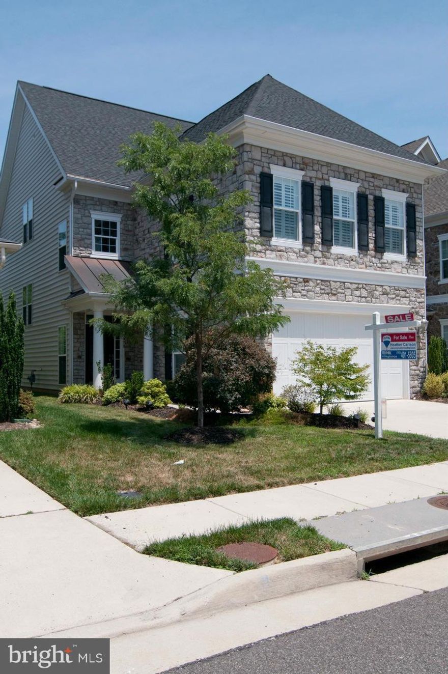 Gorgeous home built with almost every upgrade; hardwoods, plantation shutters, open floor plan, breakfast room off gourmet kitchen, wet bar and fireplace in master bedroom, formal dining room, custom wood trim throughout, 2 car garage. OPEN HOUSE SUN AUGUST 17th, 1-3pm