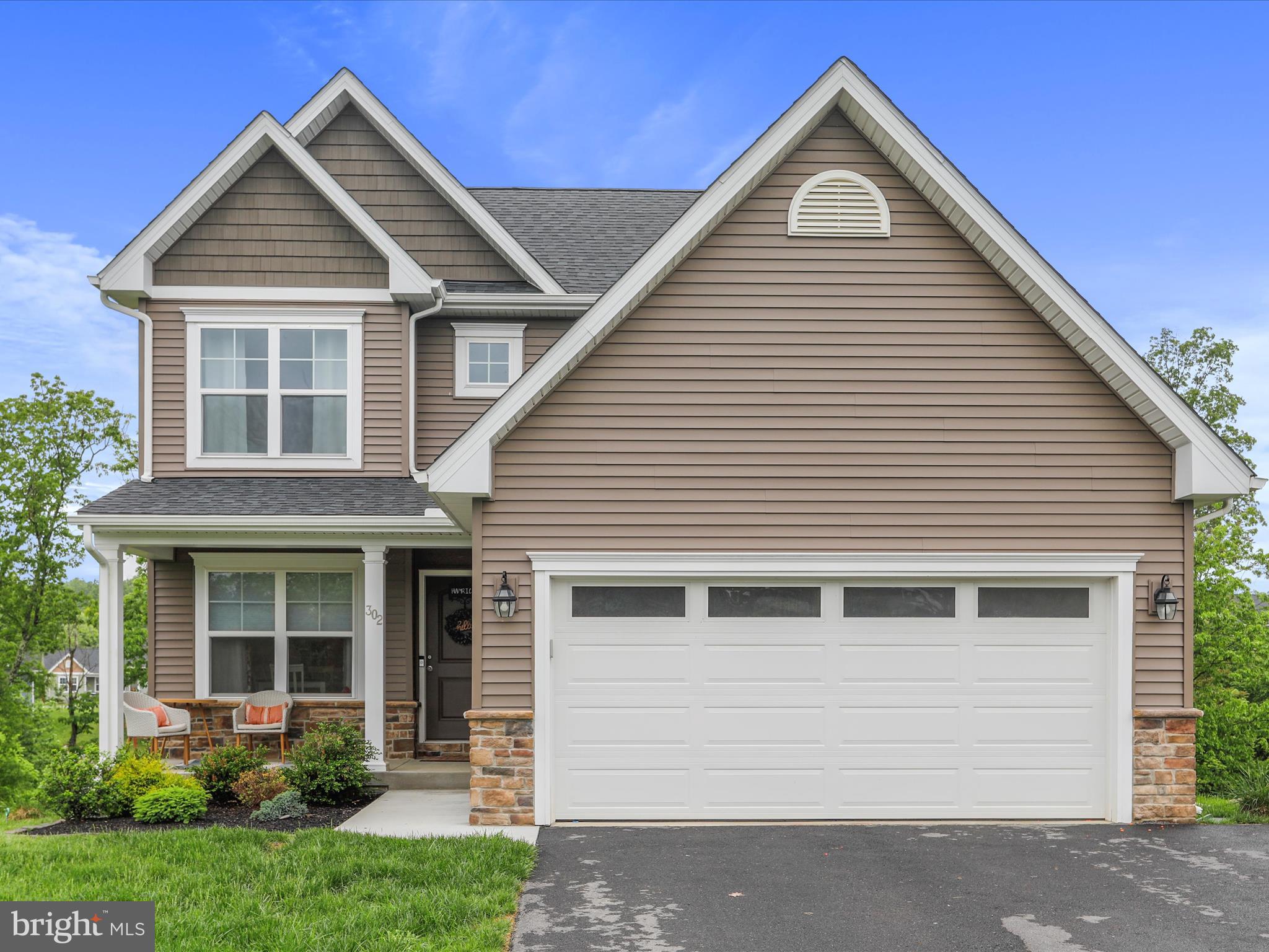 Welcome to this spacious 3-bedroom, 3.5-bathroom home offering over 2,100 square feet of living space, plus a full finished basement — perfect for entertaining, a home gym, or extra living quarters. Enjoy the durability and modern look of luxury vinyl plank flooring on the main level, with cozy carpeting upstairs and in the basement. Step out onto your deck and take in the rare privacy: no homes will be built across the street or directly behind you. The deck includes stairs leading down to a concrete patio, ideal for outdoor gatherings or peaceful mornings. This all-electric home combines comfort and efficiency, making it a standout choice in today’s market. Don’t miss your chance to own this rare gem with scenic surroundings and plenty of living space!