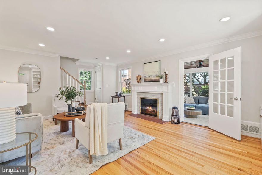 Timeless Charm, Thoughtful Renovation, and a Prime Alexandria Location! - Welcome to 620 Melrose Street, a beautifully renovated brick home (2025) nestled in the sought-after Ivy Hill neighborhood of Alexandria City. Known for its tree-lined streets, sense of community, and unbeatable convenience, Ivy Hill offers a quiet, welcoming setting just moments from Old Town, Shirlington, and Washington, DC. *Inside, every inch of this residence has been thoughtfully updated while preserving its classic character. The home features four bedrooms and three full baths, with three bedrooms and two baths on the upper level and a fully finished lower level offering a versatile bedroom and bath—perfect for guests, a home office, or recreation space. *The light-filled main level showcases refinished hardwood floors, crown molding, chair rail details, and recessed lighting throughout. A spacious living room with a wood-burning fireplace, art deco–style mantel, and custom built-ins opens to a charming sunroom featuring a wood ceiling and exposed brick accents—ideal for relaxing or entertaining year-round. *The crisp white gourmet kitchen includes all-new GE stainless steel appliances, a gas range, quartz countertops, a subway tile backsplash, and a waterfall-edge peninsula that flows seamlessly into the dining area, highlighted by a modern chandelier. *Upstairs, the primary suite offers a beautifully updated ensuite bath and walk-in closet, while additional bedrooms share another stylishly renovated full bath. The lower level adds even more flexibility with a finished living area, bedroom, and full bath. *Outdoors, enjoy a gracious, flat backyard with a lovely brick patio—perfect for al fresco dining, morning coffee, or weekend gatherings. The space offers plenty of room for play, gardening, or simply relaxing in a private, landscaped setting. Convenient driveway parking completes the picture. *Combining the warmth of classic architecture with a modern renovation, 620 Melrose Street delivers comfort, style, and a fantastic location—just minutes to local parks, restaurants, shops, and major commuter routes.