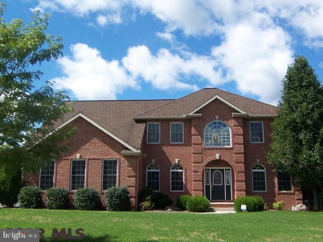 Pleasing curb appeal and nicely situated on a cul de sac, discover this classic brick two-story residence in desirable Stearns Crossing. Notable features include 9' and vaulted ceilings, hardwood floors, expansive windows and numerous aesthetic amenities. The eat-in kitchen is outfitted with stainless appliances, granite countertops and island/breakfast bar. For expanded entertaining residents are sure to enjoy a private patio retreat amid lovely perennials and trees. The main living area also boasts a great room with fireplace, formal dining area with tray ceiling, living room, office with French doors, convenient half bath and laundry/mud room. Unwind in the spacious master en suite with walk-in closet, dual sinks, soaking tub, tile shower and water closet. Three additional bedrooms and full bath complete the upper level. A finished lower level delivers a pleasant family/rec room, bedroom with egress and full bath. Two-car side entry garage and new storage shed.