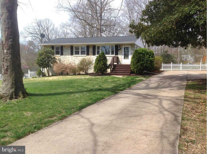 SPECTACULAR STONE RAMBLER SET ON HUGE PVT 1/2 ACRE FENCED LEVEL LOT! QUIET TRANQUIL LIVING, YET CLOSE TO AMENITIES! (SCHOOLS, SHOPS, MAJOR COMMUTER ROUTES) 2 FULL LEVELS- FINISHED WALK OUT BASEMENT W/  FULL KITCHEN. LL HAS BR, FULL BATH- RENT IT AS AN APT! OR USE AS IN-LAW SUITE- WALK OUT TO PATIO. UPGRADED KITCHEN HW FLOORS MAIN LEVEL, NEW CARPET IN 2 BDRMS. PROP ZONED FOR HOME BUSINESS. NO HOA!