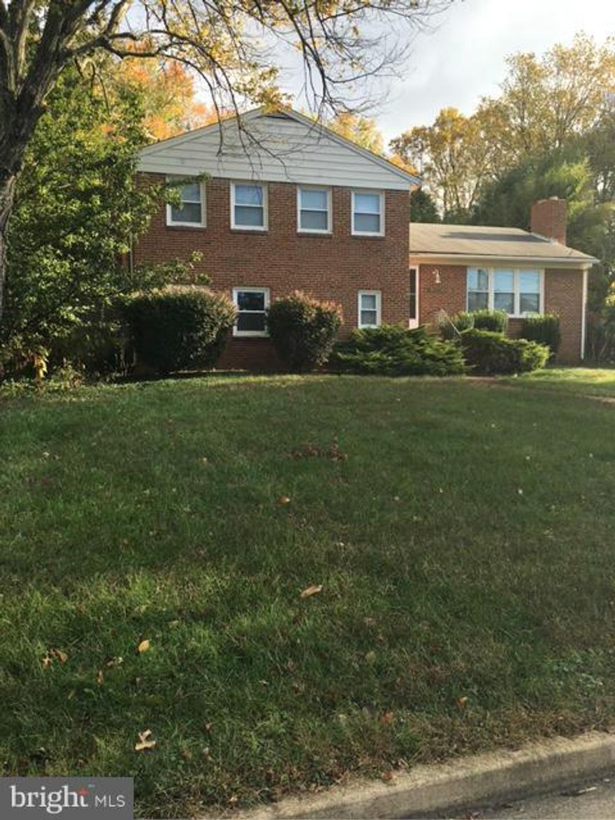 Over one half private acre located minutes from Tysons.  Make sure to pull the parcel the lot extends behind the house on the left. All brick w sun room.  It needs work but the floors are solid oak on the main and upper levels , the rooms are good sizes, there are two fireplaces , there is a teen or in law suite in the L1 that is loaded with light, LL2 is the perfect man cave, windows updated