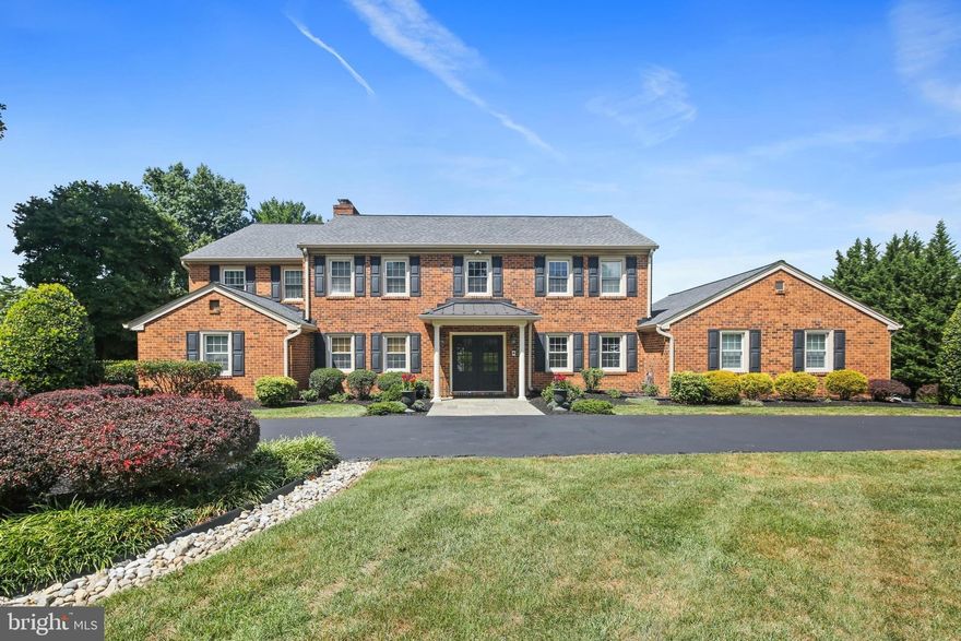 Welcome to 12154 Mount Albert Road - Nestled on 2.3 acres in a prime Western Howard County location, this unique luxury residence offers over 5,400 square feet of beautifully finished living space designed for both everyday comfort and unforgettable entertaining. Fresh paint throughout and newly refinished hardwood floors create a warm, inviting backdrop for the home’s thoughtful details and timeless character.  The main level showcases elegant living and dining rooms, fireplace, a very spacious step down family room, and two private offices—ideal for today’s work-from-home lifestyle. The updated gourmet kitchen blends form and function with high-end finishes and an open layout that flows seamlessly to a versatile bonus sitting room and large Trex deck, making it perfect for gatherings of any size.  Upstairs, the primary suite is a true retreat featuring hardwood floors, a private balcony, and an oversized spa-inspired bath with soaking tub and stall shower. A second primary suite includes a sitting room, en suite bath, and walk-in closet, while two additional bedrooms share a full hall bath, providing plenty of space for family and guests. The finished lower level is designed for relaxation and entertainment with a spacious recreation room with luxury stone finishes, fireplace, wine storage wall, full bath, and walk-out access to the back patio additional entertainment space and private oasis. Outdoor living is second to none, with a huge stone patio, built-in firepit, in-ground pool and spa, pool house, and tennis/sport court—all surrounded by professional landscaping and extensive hardscaping for a resort-like setting and feel.  Additional highlights include a two-car garage with epoxy flooring and custom cabinetry, a well pump replaced in 2024, front porch pillars and front porch roof updated in 2022, a new HVAC in 2021-2022, and a roof approximately 10 years old. From its grand entertaining spaces to its thoughtful updates and serene grounds, this home offers an exceptional lifestyle in one of Howard County’s most desirable settings. Schedule your tour today.