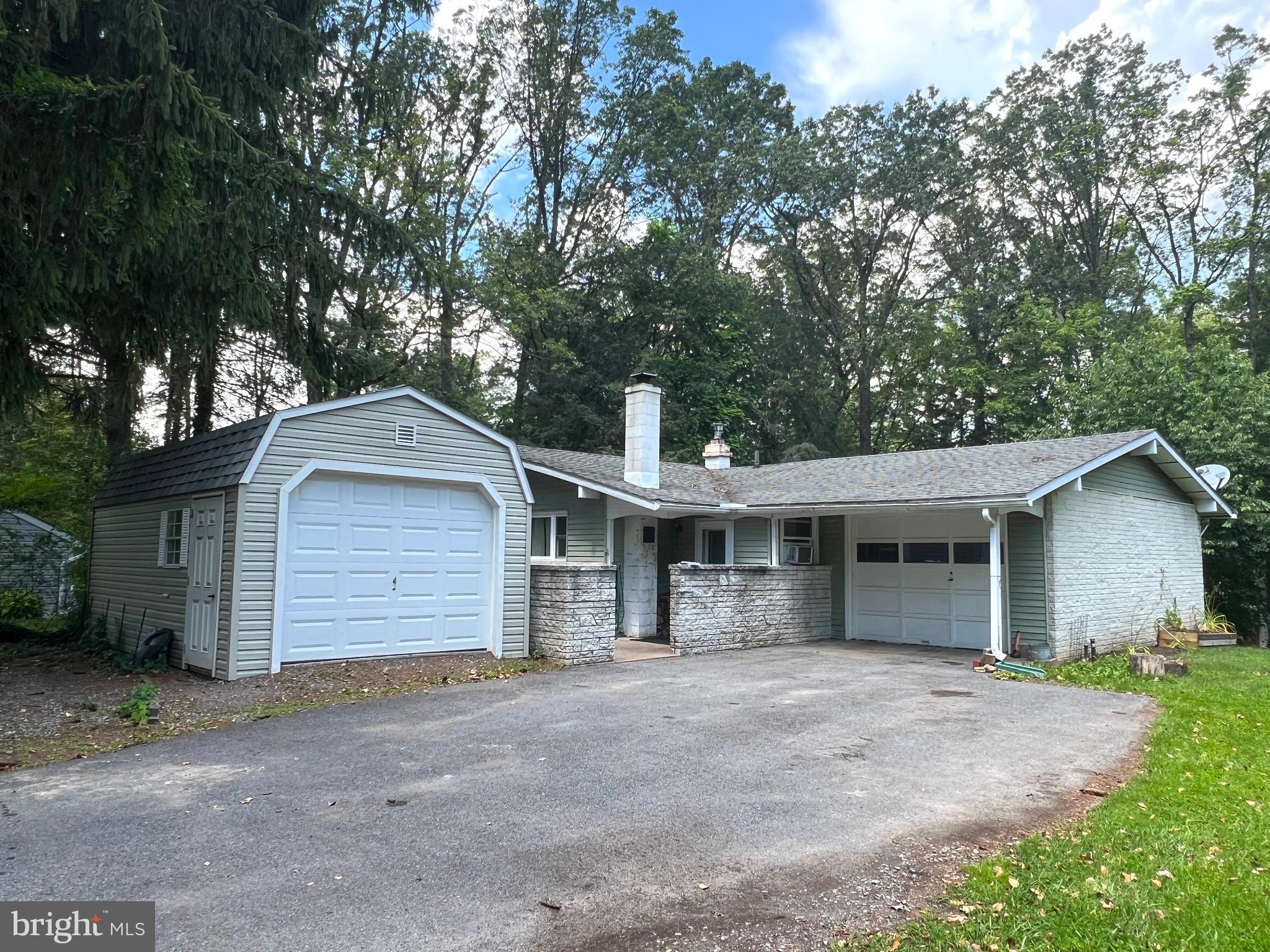 Here is a great opportunity to live in Park Forest with over 2500 square feet of living space with 3 or 4 bedrooms and 2 full bathrooms. Enjoy cooking in a large gally kitchen with a built in breakfast nook for quiet meals.If you are entertaining larger groups enjoy the large dining area adjoining the living room. This home is open and bright with 3 bedrooms upstairs and a possible 4th bedroom in the lower walk out level . The lower level comes with a pool table in the Billiard room, and a possible den . Walk outside to the back porch area to a back yard that is fenced for your family and pets. There is also a 24 x 12 attached garage and an additional detached garage providing a great bonus for a work shop, your special car or even a workshop area with electricity .There is also ample parking space beside the garage and a long driveway offering plenty of off street parking.