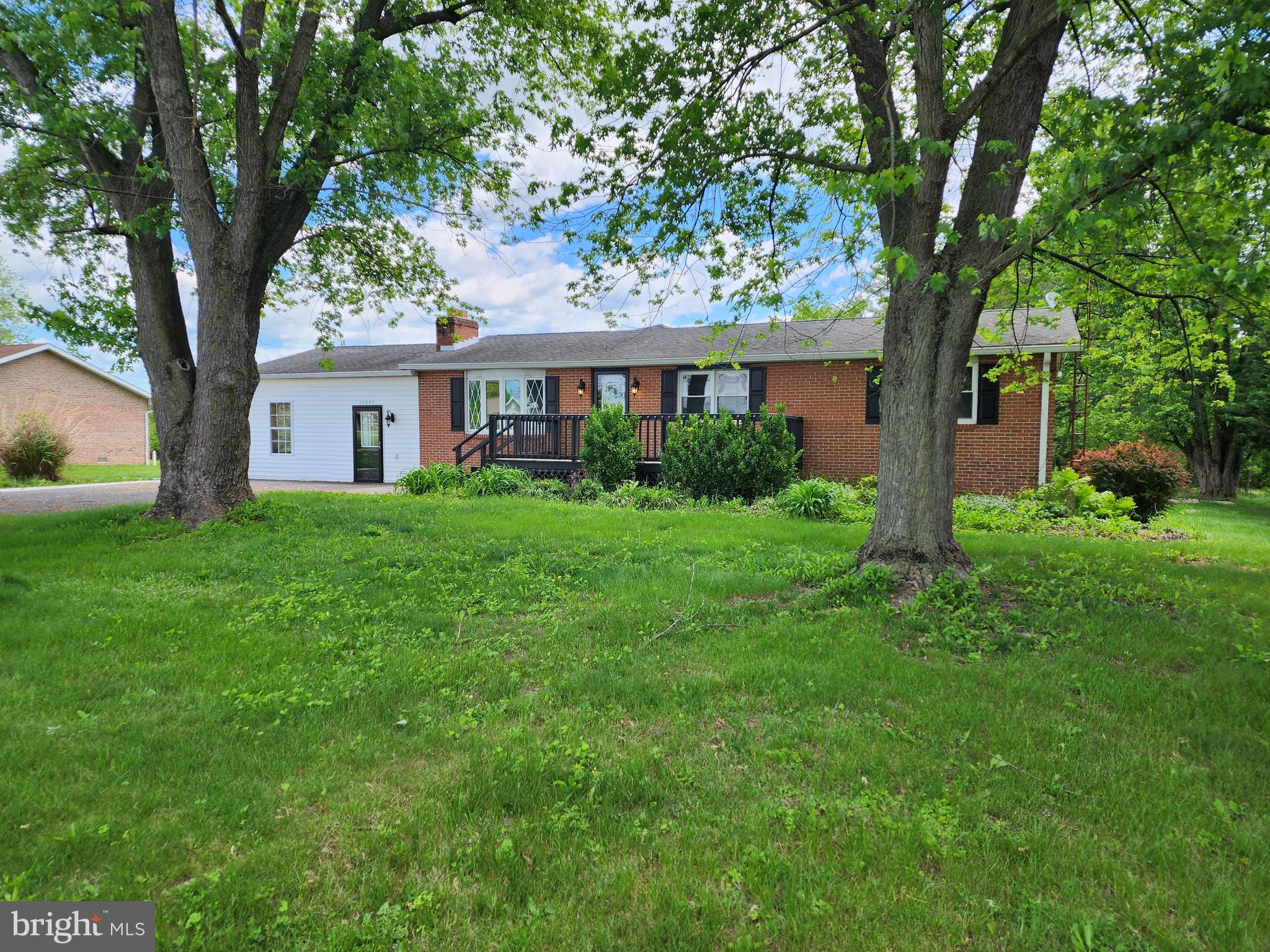 Two unit home with main level and lower level residences. Come and see this amazing country property with in-law suite in lower level that is great for those blended family situations! OR great for investors with ready to go for rental too.
Main level has laminate flooring with fresh paint and attractive lighting fixtures. Kitchen has new stove, SS refrigerator, built in microwave, full size washer and dryer in HUGE laundry room too! The layout is perfect for those needing space and wanting the country location. Main level has walk out to covered back deck off of Dining room with additional deck for lots of entertainment possibilities.
2 bedrooms are off of kitchen with separate entrance to this suite for perfect situation for home office.
You won't want to miss this one if you are looking for a home with many options!
Lower level has 3 BR, 1 bath with eat in kitchen, Living room, pantry and storage area.
Potential rent is $2100.00/main level and $1400.00/lower level.
All of this in a country setting with Smithsburg Schools too. Come see this property to add to your investment portfolio!