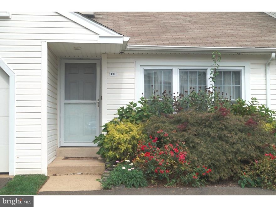 Most Desirable Hamlet Section Of Village Shires In An Ideal Location! Welcome to this perfectly maintained, absolute move-in condition, 2nd floor unit complete with upgraded flooring throughout. This home offers an open floor plan, with a galley kitchen, a breakfast bar, and a separate dining area. The living room offers a large space with wood fireplace, vaulted ceiling and access to the new deck, updated the summer of 2016. The deck overlooks a spacious common area of open tranquil space, perfect for grilling or reading your favorite book. The main bedroom offers recessed lighting, walk-in closet & ceiling fan with access to the shared full bath. An added bonus is the two car parking on your own driveway. All windows have been replaced. The Heater, air-conditioning and water heater were installed in 2015. The community offers pools, tennis, clubhouse & playgrounds. Your worry free living awaits you in this move in ready condo.