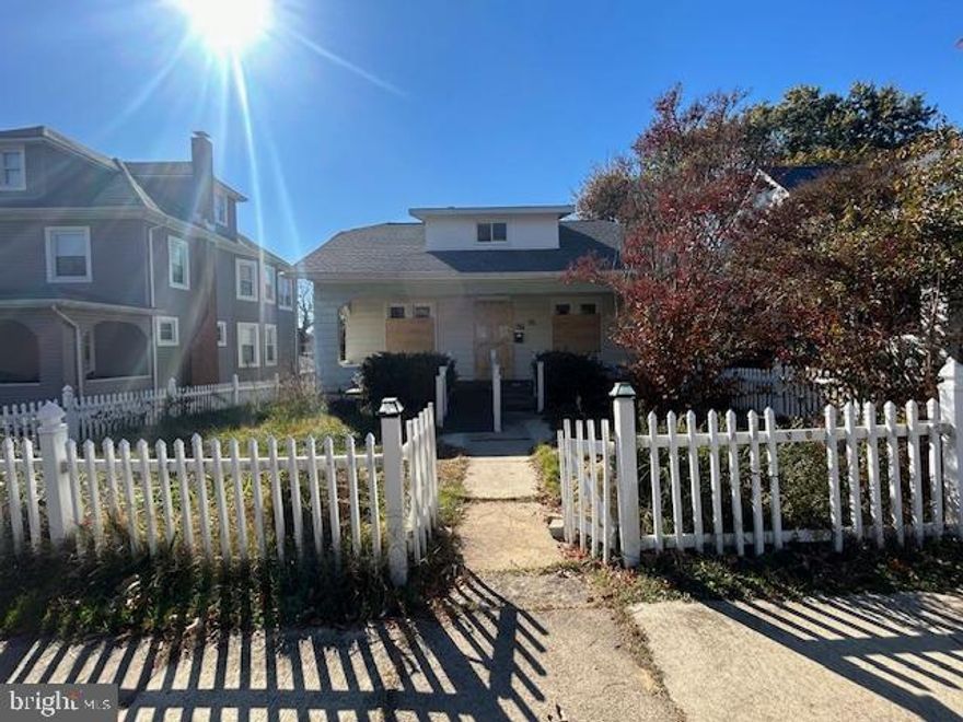 Charming 3BR, 2BA home in Lauraville area of Baltimore, with front porch , Large rear deck, partially finish basement, fenced yard with  fishpond. Upper level has master bedroom suite, with a seperate office and den.