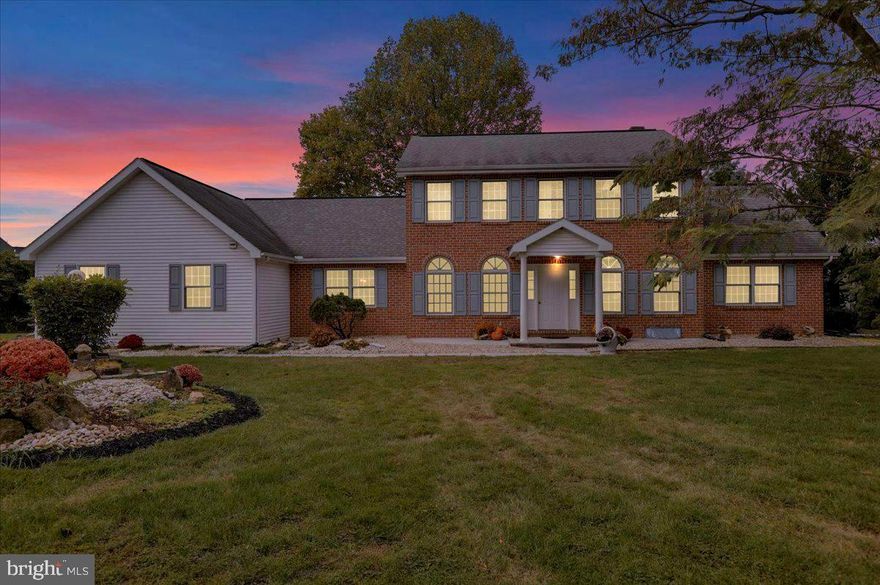 Impressive home in a desirable location, featuring a 1st floor owners suite, soaring 2 story ceilings and a spacious granite kitchen.   5 bedrooms and 4 full bathrooms, includes a second bedroom and bath on the 1st floor for guests or in-law accommodations.  The family room is anchored by a warm inviting fireplace for cozy nights in and for gathering with family and friends.  An adjacent bonus room offers plenty of space to relax and unwind while offering a flexible space to fit any lifestyle.  On to the lower level  which includes a full bath and a finished recreation room , all for your enjoyment. This home offers  comfort,  versatile spaces and style.  Set on a large lot surrounded by mature landscaping, and outdoor living areas with a patio, deck and a charming gazebo.   Call today for a showing.  OPEN HOUSE CANELLED!