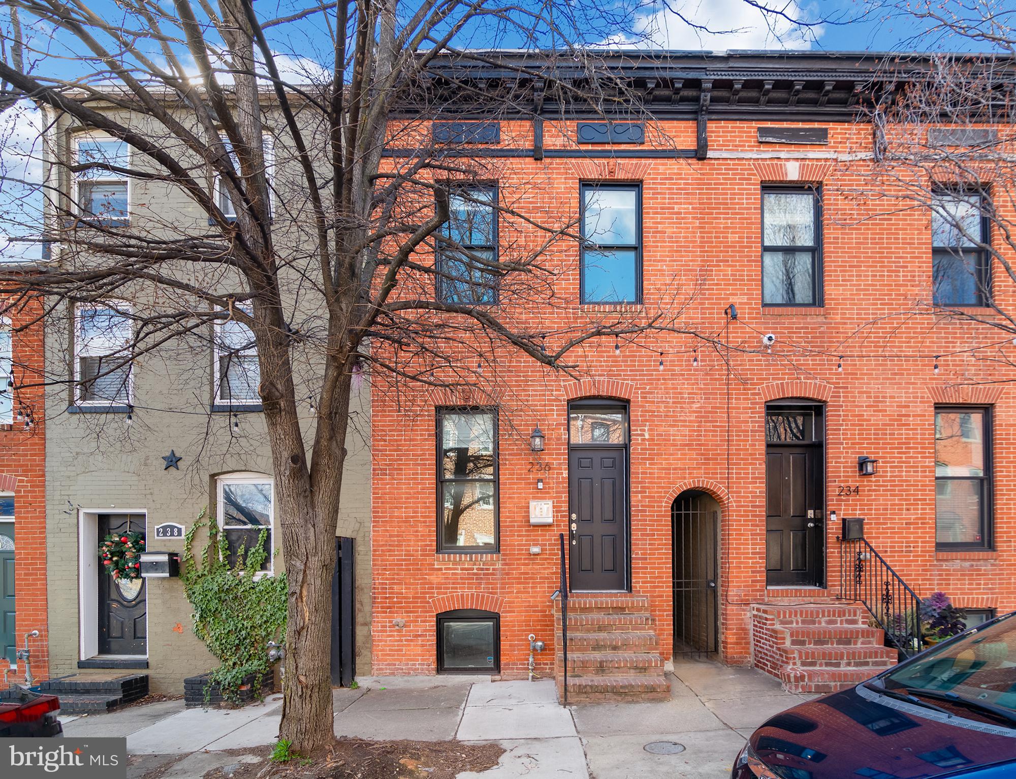4.5 years left on CHAP tax credit!! Taxes frozen at pre-renovation value. Welcome to 236 S Wolfe Street, a beautifully crafted rowhome offering the perfect blend of historic charm and modern convenience in the heart of Baltimore. Located in the sought-after Upper Fells Point neighborhood, this home is just steps away from Patterson Park, the waterfront, and the city's best dining and entertainment. From the moment you step inside, you'll be captivated by the gorgeous hardwood floors that flow throughout the home, adding warmth and elegance to the space. The open-concept main level is ideal for both everyday living and entertaining, featuring a spacious living room bathed in natural light and a well-appointed kitchen with ample cabinetry, modern appliances, and stylish finishes. The home boasts three generously sized bedrooms and 3.5 bathrooms, offering plenty of space for comfortable living. The second floor features two bedrooms and two full bathrooms, providing privacy and convenience for family members or guests. Downstairs, the fully finished basement includes an additional full bathroom, making it an ideal space for a guest suite, home office, or recreational area. One of the standout features of this home is the expansive rooftop deck, where you can enjoy panoramic views of the Baltimore skyline. Whether you're hosting a sunset gathering or simply relaxing with a book, this space is perfect for unwinding above the city. For additional outdoor enjoyment, the large rear patio offers a private retreat, perfect for grilling, gardening, or enjoying a quiet evening under the stars. With ample space for seating and outdoor décor, it’s an entertainer’s dream! Situated in a vibrant and walkable neighborhood, 236 S Wolfe Street is just minutes from local hotspots such as Thames Street, Fells Point, Canton, and the Inner Harbor. Enjoy easy access to boutique shopping, award-winning restaurants, coffee shops, and waterfront parks. Commuters will appreciate convenient proximity to major highways, public transit, and Johns Hopkins Hospital. Don’t miss this incredible opportunity to own a stylish and spacious home in one of Baltimore’s most desirable neighborhoods. Schedule your private showing today and make 236 S Wolfe Street your new address!