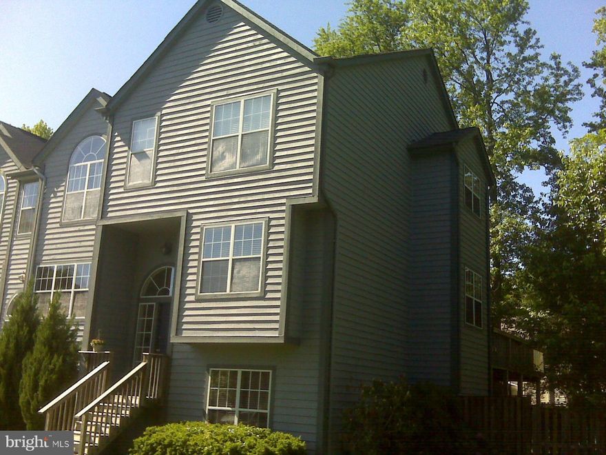 Great shape! Hardwood floors 1st fl. wainscot trim and Crown/Chair, Ceramic Counters,  great master bedroom and bath, 3 large bedrooms total!  2 up 1 down, finished  walk-out basement. parking assigned. quite neighborhood will consider multiple year lease Vaulted Ceilings.Tenant responsible for 1st 100.oo dollars of any repairs. Large deck on rear w/wrap around side, this is an end unit! Aug. 1st.