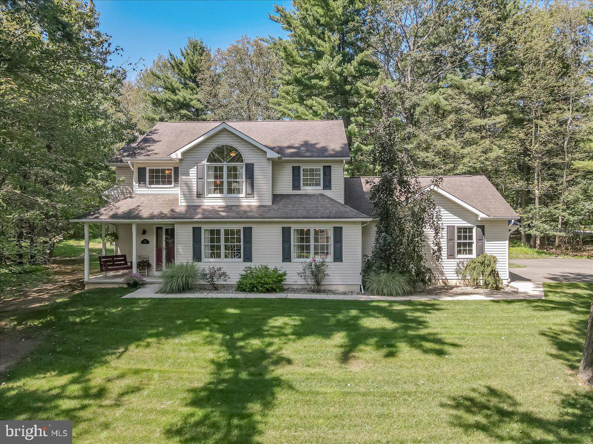 MOTIVATED SELLERS DOWNSIZING AND HAVE SECURED A NEW HOME Immaculate 3 - Bed, 2.5 - Bath Home in Desirable Saw Mill Run! This 2,333 sq ft home is move-in ready, featuring central air, an updated kitchen, renovated baths, freshly painted walls, newly carpeted areas, and new waterproof Pergo flooring in the kitchen, foyer, powder room, and family room. Enjoy a formal dining room, an open-concept kitchen, dining, and great room perfect for family gatherings, convenient first-floor laundry, and a finished basement for extra living or recreation space. The property includes a built-in 2-car garage and a newly built 2-car detached garage, plus off-street parking for 6-8 vehicles. Relax on the private rear patio with views of wildlife. Located in desirable Saw Mill Run community, just minutes from NEW St Luke's Hospital Carbon Campus, this home perfectly blends comfort, charm and convenience! Just minutes to I-476 for easy commutes to Lehigh Valley or Wilkes Barre/Scranton AND WHEN ITS TIME FOR FUN Ride your bike along the D&L Trail, go rafting on the Lehigh River, kayak and paddle board on Beltzville or Mauch Chunk lake. In winter, hit the slopes at Blue Mt, Big Boulder or Jack Frost. For year round thrills, zipline at Summit Adventure Park, take in a concert at Penns Peak, sample local vineyards or explore the history and charm of Jim Thorpe --Carbon County has it all without driving 2-3 hours to enjoy what willl be right at your doorstep