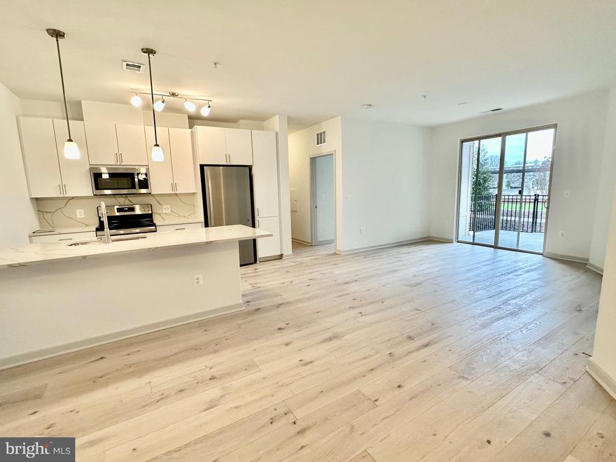 Single Level new construction condo in the City of Fairfax! Brand new condominiums include 2 beds & 2 baths, 1,198 sf , 2 parkings (ground E6 and garage #153) , storage unit, 9 foot ceilings, 6 foot windows and modern open concept floor plans, Gorgeous LVP through entire house (Foyer, Kitchen, living room, bedroom), Upgraded Stainless refrigerator, White cabinet w/ double soft close drawers, Double trash rollout, Quartz counter top with full high backsplash, Upgraded tiles in both bathrooms floors and master bathroom with Frameless shower door, wall tiles from floor to ceiling and double sinks, 1 covered garage and 1 assigned parking, First floor unit with a walk-out 11"X5" patio back to private area, Amenities include: a resort style courtyard with an outdoor pool, outdoor grilling and dining terrace, , Fire pit, Seating and garden area, Convenient year-round locker room and shower area, Fitness Center with cardio and weight equipment, Party Room with catering kitchen, Club Room with large screen TV, Spacious package room for each lobby, Full-time manager and underground secure parking. Convenient location, close to restaurants, shopping and major commuter routes such as 495, 66, 50 & 29.