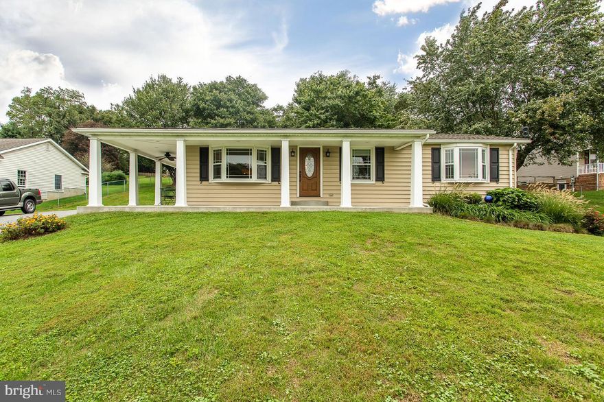 *Impeccably Maintained*Comfortable One-Level Living w/ Breathtaking View*3 Bed/2 Full Bath Rancher w/ Fully Finished Basement*New Roof(2013)*New Windows(2013)*New Front/Side Porch(2013)*New Water Heater(2014)*New HVAC(2013)*Impeccably Maintained*HRDWD Floors*Built-in Shelving*Fully Fenced Yard*Extra Storage Space in Basement*Convenient Location*One Owner--Retiring to Sunny Florida!