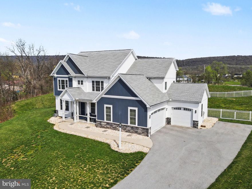 Luxury Reimagined in Hawks Landing. This masterfully designed 2020 custom home by Haven Homes situated on an end lot underwent an extensive 2022 remodel, resulting in a 5BR/5.5BA masterpiece of craftsmanship. The main level shines with 9' ceilings, luxury vinyl plank floors, fresh paint and exquisite details throughout. At its heart is a true Chef’s Kitchen featuring an oversized quartz island (seating 8+), dual ovens, a walk-in pantry, and a butler’s pantry with a beverage fridge. Two washer and dryer sets provide flexibility for multi-generational living. Relax in the sunroom or retreat to the Primary Oasis, a spa-like sanctuary completed with an oversized soaking tub, and a custom tile shower with triple shower heads and dual controls. On demand hot water and softening system add that extra touch of convenience and luxury. Storage is plentiful as three bedrooms have walk in closets with convenient full size mirrors. Entertainment options abound with a finished lower level adding 1,000+ sq ft of living space - including a 5th bedroom, full bath, flex room and potential for a 6th bedroom. Car enthusiasts will love the 3-car garage, complete with a built-in power washing system and both pin pad and app access for ease of access. Outdoor living is effortless with a composite deck and fenced-in yard fully irrigated by Susquehanna Irrigation Pros. Sophistication meets functionality in every detail. Even down to the integrated candles in every window and owned security system both installed by Today’s Home & Leisure. Natural gas hookups already installed for both laundry room and kitchen if you prefer. Schedule your tour today, this home is sure to impress!