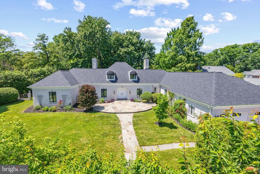 One-of-a-Kind estate-like home on a quiet cul-de-sac with seasonal river views! This all-brick French Provincial home located in the Riverwood neighborhood of Mount Vernon features three fully finished levels with a main level primary suite, expanded upper level, full basement, mature landscaping around the home and an oversized 2-car garage with additional storage area.

The expansive main level offers an opportunity for one-level living with a main level primary suite that features two walk-in closets, full bath with roll-in shower, dressing room/additional bath, and office/additional bedroom. The spacious formal living room features a large picture window overlooking the serene backyard, beautiful and intricate decorative molding on walls and ceiling, a wood-burning fireplace with mirrored surround, and rear exterior door to access the back patio. Adjourning the living room is the dining room, which features hardwood floors, chair rail molding, and a large picture window. The eat-in kitchen includes a gas-fireplace, indoor gas grill, breakfast area, and center island. The den/family room is located off the kitchen with built-in bookshelf and garage access. A half bath and laundry room are also conveniently located on the main level. The front and back yards feature an in-ground sprinkler system, large flagstone patios, and mature landscaping (with several fruit trees including fig, apple, peach, and room for a vegetable garden on the side of the home). The backyard is also fully fenced with a gate on both sides. 

The upper level hosts two bedrooms, a full bath, and space for bonus room/office/den with three additional storage closets and expanded attic space. The basement level is fully finished with an entertainment bar, gas fireplace, and half bathroom. This level also includes a storage room with spare freezer and access to walk-out stairs through the storm cellar.

Sellers have recently replaced all carpets & repainted the entire interior on all three levels. Since 2019, sellers have replaced the two large windows in the living & dining room, replaced the sliding glass door in the kitchen, added new awnings and frames to the upper dormer windows, and installed a new HVAC system for the upper zone. In 2011, the home went through a major update that added two bedrooms to the upper level, added hardwood floors in one of those upper bedrooms, and replaced the bedroom dormer windows. In 2017, the main level primary suite bathroom was updated to include an ADA accessible roll-in shower. Roof was recently replaced in 2023.

The Riverwood HOA offers residents community amenities including a playground, picnic area, sport court, sidewalks through the neighborhood, walking path with access to private beach on the river, as well as community events/parades/activities throughout the year. The neighborhood is also in walking distance to local pool and tennis courts at Mansion House Club and an easy drive to Ft Belvoir, Old Town Alexandria, DCA Airport, and Washington DC.