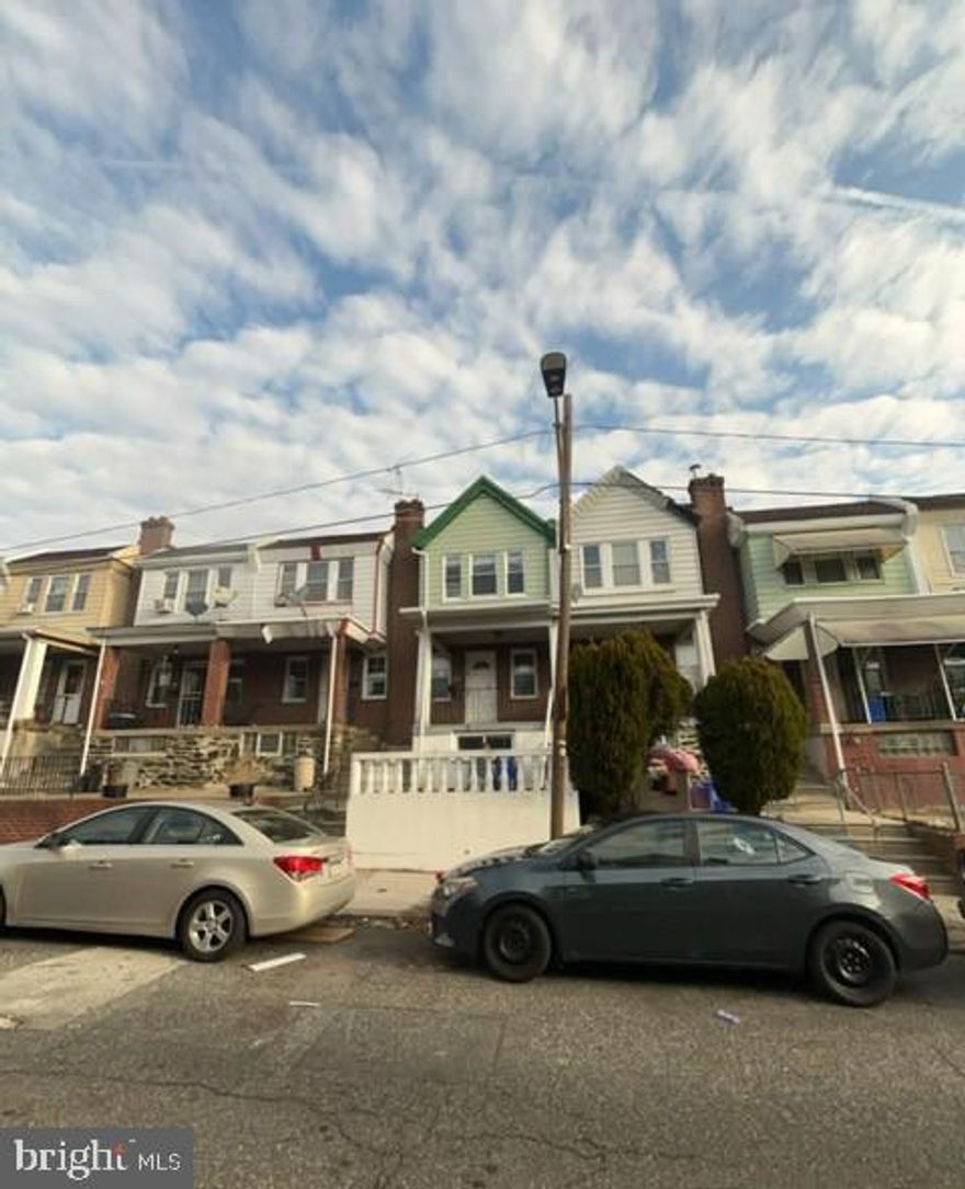 Grand opportunity for this spacious Two-Story Brick row located in the Olney section of Philadelphia. Property features open front porch great relaxing after a long day. Walk into a spacious living room, dining room, kitchen with walk out access small rear landing. Upper level shows 3 good sizable bedrooms with ample closet space and 3pc. hall bath. Partially finished basement with walkout access to rear driveway, conveniently close to local shopping, schools, transportation and mins. away from major roadways.