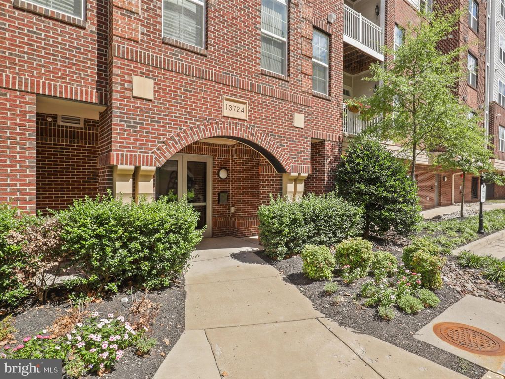 Photo of 13724 Neil Armstrong Avenue #408, HERNDON, VA 20171 (MLS # VAFX2273800)