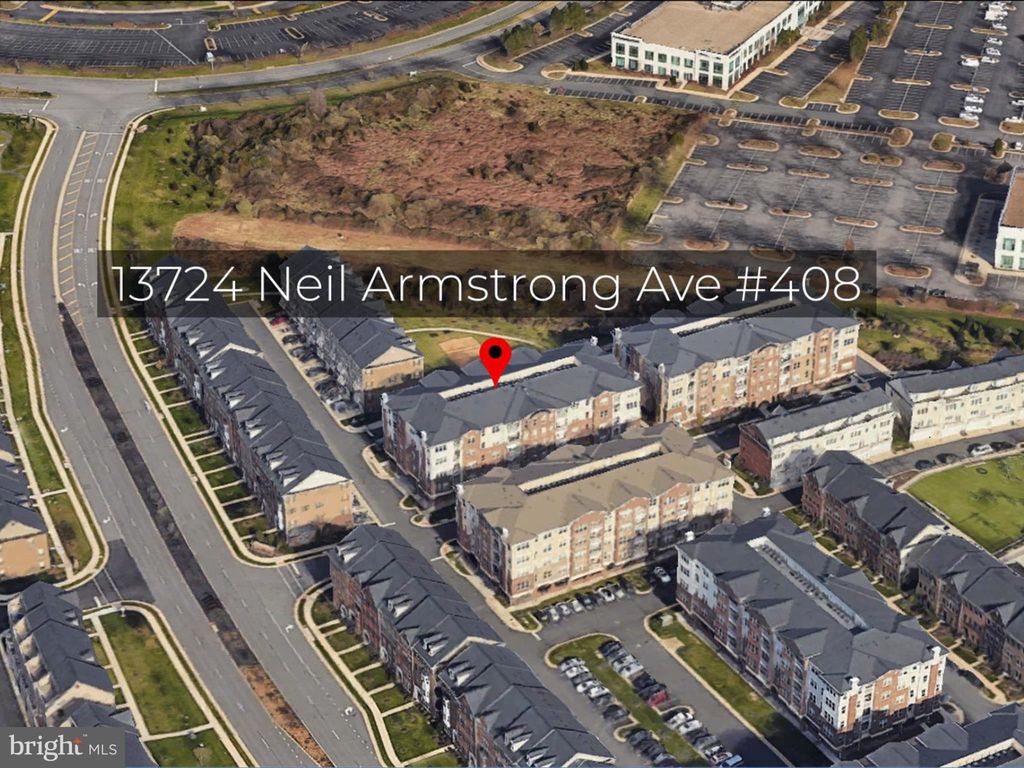 Photo of 13724 Neil Armstrong Avenue #408, HERNDON, VA 20171 (MLS # VAFX2273800)