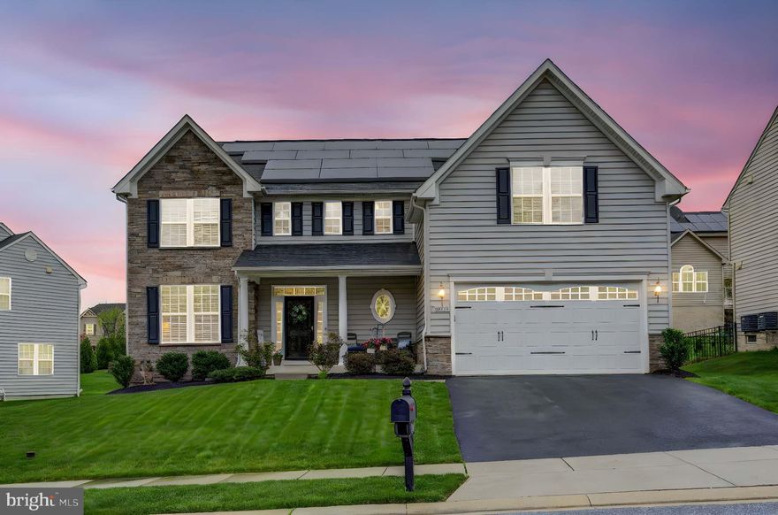 Exceptional Luxury & Energy Efficiency in Windlass Overlook

Discover one of the largest and most upgraded homes in the highly desirable Windlass Overlook community! Boasting over 5,000 total square feet, this meticulously maintained Colonial offers a rare combination of space, luxury, and long-term value.

Step inside to a grand two-story foyer and be greeted by brand new luxury laminate flooring and a bright, open-concept layout ideal for modern living. The gourmet kitchen is a true showpiece—complete with an oversized island, 42” white cabinetry, granite countertops, stone backsplash, stainless steel appliances, double wall ovens, and a large pantry. It flows seamlessly into a sun-drenched morning room with plantation shutters and a spacious family room centered around a gas fireplace.

Upstairs, you’ll find five generously sized bedrooms—including a luxurious Primary Suite with dual walk-in closets and a spa-inspired bath with soaking tub, separate shower, and double vanities. Brand-new carpet throughout the upper level adds fresh appeal.

The fully finished basement extends your living space with brand-new carpet, a granite-topped wet bar, a full bath, a large recreation room, and a versatile bonus room perfect for a home theater, gym, or guest suite.

Outdoor living is just as impressive with a low-maintenance Trex deck overlooking a beautifully maintained yard—ideal for relaxing or entertaining.

This home is fully loaded with premium upgrades and energy-efficient features, including an Energy Star HVAC system, appliances, LED lighting, tankless water heater—and leased solar panels that produce a net-negative electric bill. That’s right—BGE pays you. Enjoy monthly savings and long-term sustainability.

Ideally located near shopping, dining, and major commuter routes (I-95 & I-695), this home offers luxury, comfort, and unmatched value in one of Baltimore County’s most sought-after communities.

Don’t miss your chance to own this standout home—schedule your private tour today!