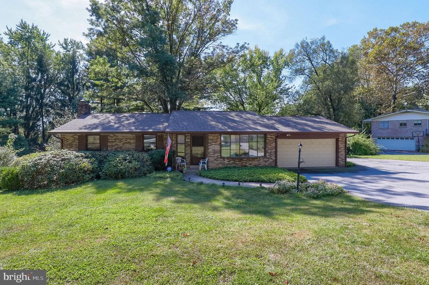 3 bedroom ranch style home in Manheim Township s desirable Blossom Hill neighborhood. Home features hardwood floors, master bedroom with master bath and finished daylight basement with powder room and potential for fourth bedroom. 2 car garage and rear patio leads to private backyard with mature trees .