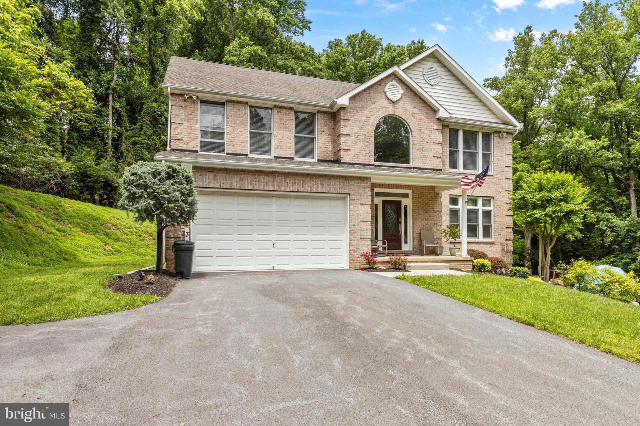 Classic all brick colonial in Glyndon on 2.52 secluded wooded acres! The open concept main level offers 9' ceilings and a contemporary look with ceramic tile floors throughout, a sophisticated kitchen with large center island, concrete counters, recessed lighting, updated stainless steel appliances and gas cooking open to an inviting family room with a gas fireplace. The upper level primary bedroom has vaulted ceilings, huge walk-in closet, a spa-like primary bathroom. 3 additional bedrooms occupy this level and another full bathroom. A bright finished lower level that is in pristine condition, game room/recreation room and 3rd full bathroom, walk-out to side yard. 9' ceilings on all 3 levels. oversized 2 car attached garage with built-in shelving plus a barn that has 2 levels, and there is plenty of additional parking for RV or a boat! No HOA! The address is Central Ave but you will need to turn on Glyndon Mews and take the 2nd driveway on the right, this is the next driveway after the school drive. Actual zip code is Glyndon 21071