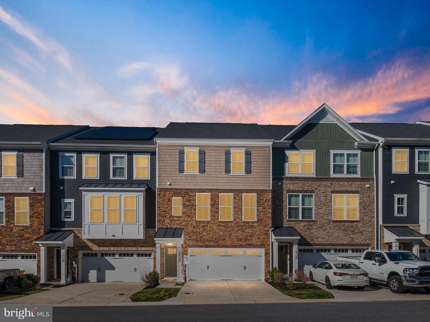 Welcome to this beautifully maintained 3-bedroom, 2 full/2 half bath townhome, just 5 years young and perfectly situated for effortless commuting to DC, Fort Meade, or Baltimore via nearby access to Routes 97 and 50.

Step inside to a welcoming entryway that offers a convenient landing zone, with access to the finished lower-level living space—perfect for a home office, gym, or second family room—complete with a half bath and direct entry to the spacious 2-car garage.

Upstairs, enjoy an open-concept main level designed for modern living. The stylish kitchen features ample counter space and flows seamlessly into the breakfast nook, dining area, and expansive family room—ideal for entertaining or everyday living. A conveniently located half bath adds extra ease.

On the upper level, you'll find a spacious primary suite with a large walk-in closet, generous en suite bathroom with dual vanities, and bonus space within the bedroom perfect for a sitting area or home office. Two additional bedrooms, a full bath, and a well-placed laundry room complete the top floor.

This home offers the perfect blend of style, functionality, and location—don’t miss your chance to call it yours!