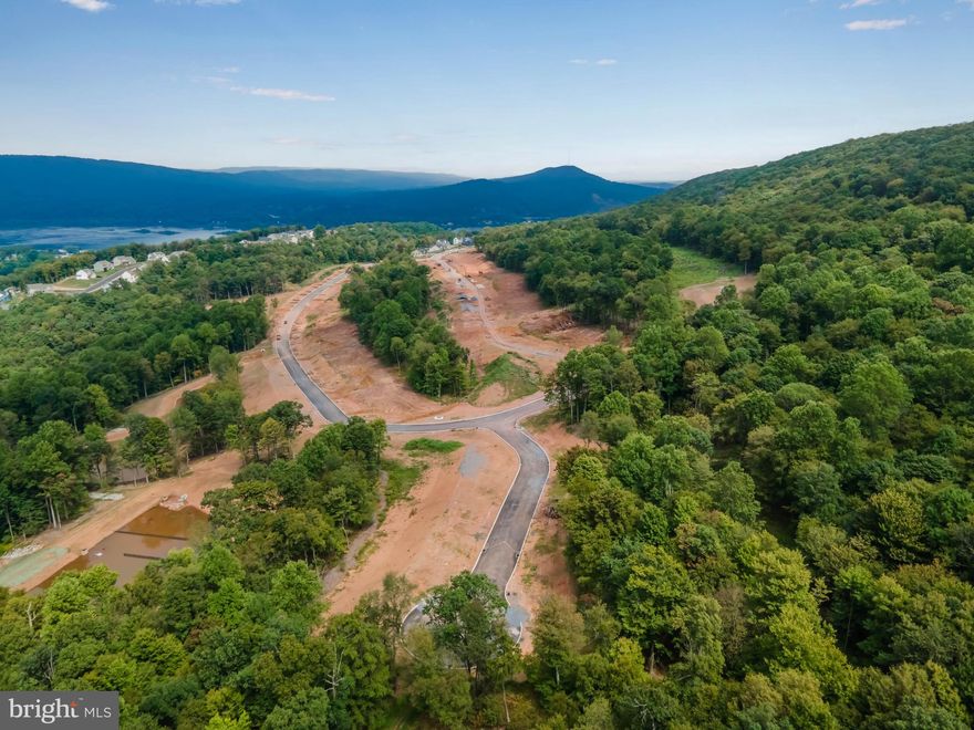 Ready to claim your own slice of paradise? This 1.08-acre wooded wonderland in Rockville Estates isn’t just land—it’s your future backdrop. Imagine building your dream home with Yingst Homes Inc. where modern design meets nature’s best gallery. Enjoy endless trees and panoramic views that are practically begging to be your next Instagram story. This lot is the canvas for your next big adventure. Trust us—Mother Nature approves, and your future self will thank you for the escape. Let’s build something epic!