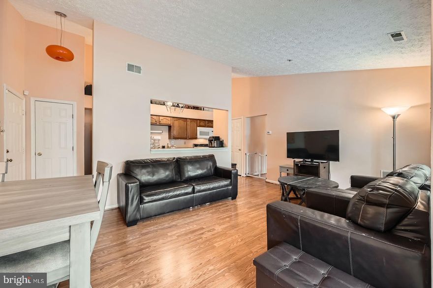 Welcome to easy, stylish living at 1317 Greenbriar Circle, Unit #7-1317 — an inviting upper-level condo located in one of Pikesville’s most desirable communities. Set within a quiet court on sought-after Greenbriar Circle, this beautifully maintained home offers the perfect combination of comfort, convenience, and value.  Step inside and immediately appreciate the airy feel created by soaring cathedral ceilings and abundant natural light. Elegant Pergo flooring runs seamlessly throughout the entire unit, adding warmth and continuity to the space. Large, replaced windows frame peaceful views and bathe the home in sunlight.  The open-concept living and dining areas are ideal for relaxing or entertaining, while the updated HVAC system (brand new in 2023) ensures year-round comfort and energy efficiency. Whether you’re enjoying a quiet evening at home or hosting guests, this condo provides a stylish and functional backdrop for your lifestyle.  Located just moments from shopping, dining, and major commuter routes including I-695, this condo  offers unparalleled convenience without sacrificing peace and quiet. Plus, with FHA approval, financing options are even more accessible, making it easier than ever to own in this fantastic community.  Don't miss the opportunity to live in a prime Pikesville location, surrounded by amenities, yet tucked away in a serene, private setting. Schedule your tour today — your next chapter starts here at Greenbriar Circle!