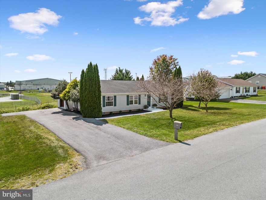 Comfortable 3-Bedroom Ranch with Primary Suite and Oversized Garage!
Welcome to this well-maintained 3-bedroom, 2-bath ranch-style home that offers simple comfort and functionality. The primary suite features an ensuite bath and a spacious walk-in closet, providing a private retreat. The home has easy-care luxury vinyl floors throughout, making it both practical and modern.
The open kitchen-dining-living area is perfect for a casual lifestyle.  The kitchen flows conveniently into the laundry/mudroom, offering direct access to the oversized 1-car garage.  This large garage not only has room for your vehicle but also offers extra space for a workshop, home gym, storage for outdoor equipment, or even a hobby area.
This home offers everything you need in an efficient, one-level layout, with a great blend of comfort and practicality all backing to the Martinsburg airport and National Guard for an extremely easy commute!  Also close to I-81 with easy access to Winchester,VA and Hagerstown, MD.  Check out this house today for a great long term investment!