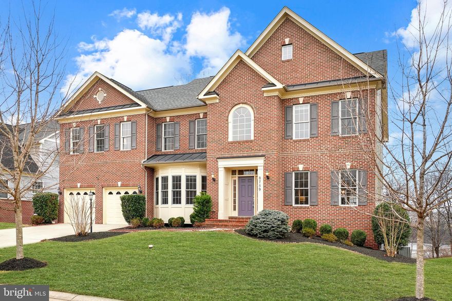 Absolutely stunning and move-in ready, this 6,800+ finished square foot colonial backs directly to beautiful Stone Lake and was the model home for the community with all of the bells and whistles! It is located within the prestigious, gated Stone Lake community in Howard County. Thoughtfully designed with every upgrade imaginable, this exceptional home showcases refined finishes, generous living spaces, and breathtaking lake views throughout.

The main level is filled with natural light and features gleaming hardwood floors, elegant crown molding, and refined architectural details. A formal dining room with wainscoting, chair rail, and crown molding leads to the gourmet kitchen, complete with a large center island, gas cooktop, double wall ovens, microwave, side-by-side refrigerator, oversized pantry, and a built-in homework desk. The breakfast area flows seamlessly into the sunroom, which opens to a maintenance-free deck overlooking the lake—perfect for relaxing or entertaining. The adjacent family room features a gas fireplace with stone surround and expansive windows. Completing the main level is a main level office or bedroom with glass French doors and a beautiful rounded bay window, along with a convenient powder room.

Upstairs, the expansive primary suite offers vaulted ceilings, a sitting area, two walk-in closets, and a luxurious spa-style bath with dual granite vanities, soaking tub with lake views, separate shower, and private water closet. Three additional generously sized bedrooms include a Jack-and-Jill bath and a separate en-suite bedroom, along with a conveniently located upper-level laundry room.

The fully finished, walk-out lower level provides exceptional light, and additional living space with a large recreation room, spacious bedroom, upgraded full bath, and ample storage. Fresh paint and brand-new carpeting make this home completely turnkey.

Set behind the gates of the highly sought-after Stone Lake community, 8743 Weathered Stone Way offers not just a home, but a true lifestyle. Residents enjoy 24-hour security and access to a stunning 25-acre lake with private beach, boathouse, stocked fishing, and boat slips, as well as walking and jogging trails, tennis and pickleball courts, practice putting green, baseball fields, playgrounds, and a lakeside pavilion available for private events. Lawn care and snow removal are included, allowing for effortless living. Ideally located in Howard County, this is a rare opportunity to experience luxury, space, and resort-style amenities in one of the DMV’s most desirable communities.