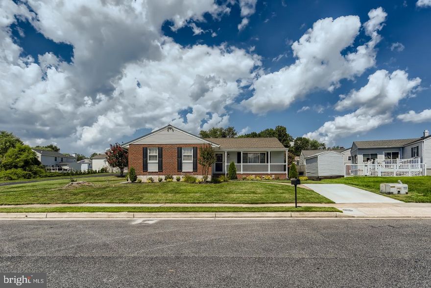 Brick Front Rancher with Covered Front Porch and Center Hall entry located at end of the non-thru street! 
Newest updates include: 
* New HVAC system with Smart Thermostat.
* New cement patio.
* New cement driveway
* New manicured landscaping with all-season blooming flowers
* Rebuilt front porch. Installed new ceiling, posts, and railings.
* Installed gutter guards.
* Removed old fences.
* Upgraded electrical system to 200A with outside emergency shut off in accordance with local county regulations.
House is Comcast and Verizon Fios ready.
__________________________________
Updated, L-Shaped Kitchen w/42 Inch Cabinets, Whirlpool 5 burner, double oven range with Decor Hood, Whirlpool side by side refrigerator w/icemaker, Kitchenaid Dishwasher and ceramic floors open to Breakfast Area with built-in Butler Beverage Bar and rear Three Season Sunroom. 
Sunny formal Living and Dining Rooms, 3 Bedrooms and 2 Full Baths on Main Level. Hardwood Floors. Lower Level complete with L-Shaped Family Room, Game/Workout Room, Office, Third Bath, and large Utility Room with Washer, Dryer, and rear exit. Natural Gas Heat, CAC, Architectural Shingle Roof/2 Years. Updated baths, freshly painted, LOTS of closets/storage space plus pull-down stairs in Sunroom for additional storage. Move-in ready. Fenced rear yard, shed w/potting bench, and off-street parking. Above grade finished living area includes  Available for immediate possession.