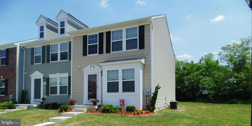 PRICE REDUCED!!Spotless like new 3 level end Townhouse Bunker Hill with 2000+ sq ft! 12 ft extension all levels. Main level lg country kitchen with oversized island, 42" cabinets, upgrade appliances and sunny morning room backs to privacy Lower level with rec room, 1/2 bath, laundry room and additional room with walkout for storage or office/den.