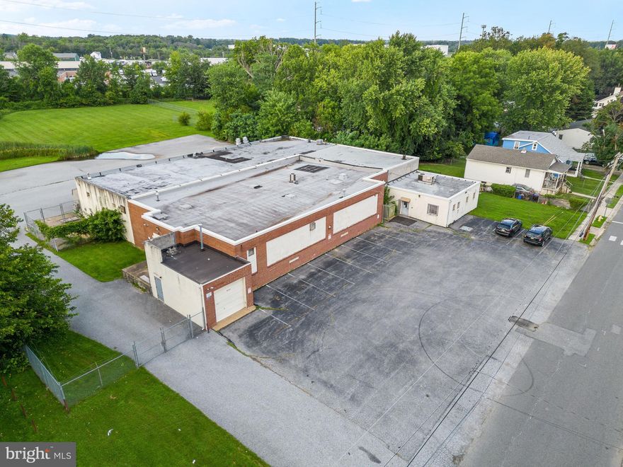 🏭 Unveiling a Commercial Marvel: 13,000 sq ft of Untapped Potential!
An extraordinary opportunity awaits for those with a discerning eye for possibilities. Behold a sprawling 13,000 sq ft building, a true embodiment of untapped potential, strategically poised for business success. This exceptional property boasts an abundance of features that fuel the imagination and is primed to become the cornerstone of your entrepreneurial journey.
Nestled upon an expansive lot, the property offers an ample parking expanse that seamlessly merges practicality with convenience. Beyond, a secure fenced yard beckons, ready to accommodate your diverse needs. Multiple garage doors punctuate the façade, promising seamless access and effortless logistics, setting the stage for your business's grand entrance.
Step inside to discover an expansive interior with soaring ceilings, a blank canvas awaiting your creative brushstrokes. The diverse office spaces provide the ideal backdrop for establishing your enterprise's nerve center or envisioning a dynamic co-working haven.
Although the bathrooms feature only essential fixtures—sinks and toilets—the property's ingenuity allows for effortless customization, transforming these spaces to meet your unique requirements. A fully functional kitchen awaits your culinary aspirations, poised to be the heart of a bustling eatery, a catering hotspot, or a central gathering point for your team.
One highlight that cannot be overlooked is the loading dock, a testament to the property's practical design. Seamlessly facilitating logistics and supply chain needs, this feature streamlines operations, befitting distribution, warehousing, or even manufacturing ventures.
The property is being offered in its present condition, opening a world of possibilities for you to mold and shape. Detailed insights into usage and occupancy are available in the document section, a valuable resource that offers a clear roadmap for potential adaptations and business models.
As you embark on this journey of discovery, envision an array of enterprises that can flourish within these walls. This versatile canvas invites you to unleash your creativity and bring your dreams to life. Whether you're a seasoned entrepreneur seeking a new flagship location or an astute investor poised to transform this space into a thriving business hub, the potential is boundless.
Don't hesitate to seize this chance to redefine your business's future. Schedule a viewing today and step into a realm of boundless possibilities. Your business's new home is ready to be revealed. 🏭🌆Seller is selling as is and use and occupancy is asked to be completed by buyer.