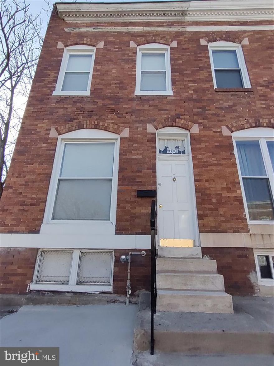INVESTOR ALERT! Add this great turn-key rental property to your investment portfolio. The property is occupied by very long term tenant who has lived in the house and taken very goood care of it for over 25 years. He has never missed a payment or paid his rent late. The tenant also pays the water bill and always pays it on time as well. He would like to stay in the home of possible, but he is also ok with leaving if given the appropriate notice from the new owner. The current rent is $875/month. But it has not been raised in several years. The house is being sold AS-IS, but the owner is not aware of any issues with the house. A handful of houses have been completely renovated on the block over the last 2 years, and completely renovated homes that have been rented out are appraising for in between 180k and 215k. And the average market rent for recently renovated row homes in the neighborhood is in between $1,400 and $1,900 per month. A FREE 1 year home warranty from the Seller will be included with purchase!