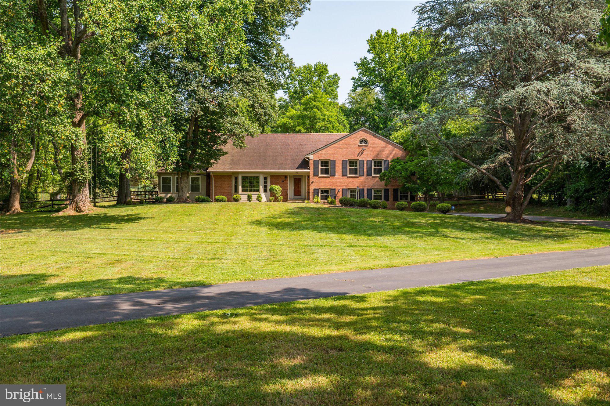 Welcome to 10120 Chapel Road – one of Potomac Village’s premier locations! Nestled on a stunning 2.95-acre lot, this unique property offers the best of peaceful country living with exceptional resort-style amenities. Enjoy the recently reconditioned swimming pool (June 2023), refurbished tennis/sports court (2023), a gazebo with hot tub, expansive deck, and multiple patios—perfect for outdoor entertaining.
The charming "Old Potomac" home features a welcoming entry that opens to a spacious living room with fireplace, formal dining room, and a light filled family room with vaulted, beamed ceilings and a striking floor-to-ceiling wood-burning fireplace. The kitchen, renovated in 2012, offers granite countertops, a large center island with breakfast bar, stainless steel appliances, and custom cabinetry.
Upstairs, you’ll find four bedrooms and three beautifully renovated bathrooms (2012), including a spacious primary suite with an ensuite bath. The two lower levels include a mudroom, half bath, large recreation/game room with fireplace and walk-up access to the backyard, laundry area, storage, and utility space.
Refreshed and move-in ready, the home features hardwood or tile flooring throughout most rooms. Located on a quiet no-through street in the top-ranked Montgomery County school cluster—including the recently built Potomac Elementary just around the corner—this home is just blocks from the shops and restaurants of Potomac Village, with easy access to DC, downtown Bethesda, Tysons Corner, and major commuter routes.
Offering unmatched privacy, expansive grounds, and an incredible outdoor lifestyle, this one-of-a-kind property is the perfect place to call home. Yard maintenance, plus seasonal swimming pool opening and closing are included in the rent. HOC applicants welcome.