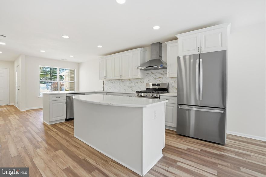 Welcome to 1004 Waterford Rd. Completely remodeled in 2026, this 3 bedroom, 2.5 bath townhome in Lower Makefield Township offers modern finishes, open living space, and low-maintenance HOA living. Located in Yardley’s Brookstone community, the home blends updated design with everyday convenience.

The main level features a fully redesigned open floor plan with wide-plank luxury laminate flooring, brand new recessed lighting, and a wood burning fireplace that anchors the living area. The brand new kitchen includes white shaker cabinetry, quartz countertops, an 8-foot breakfast bar, center island, tile backsplash, and stainless LG appliances including a gas range with vented hood. A remodeled powder room, garage entry and dedicated laundry room with new LG washer and gas dryer complete the first floor.

Upstairs, the primary suite offers a vaulted ceiling, new luxury carpeting, and a fully remodeled bath with new shower, tile flooring, 72-inch vanity, updated lighting, and fixtures. The hall bath has also been fully renovated with new tile, vanity, mirror, and lighting. Every switch, outlet, and light fixture has been updated for a clean, modern finish. The other 2 sizeable bedrooms round out the the second floor.

Brookstone HOA includes exterior building maintenance, lawn care, snow removal, trash, common area maintenance, plus access to the community clubhouse, swimming pool, and tennis courts.

Located in Pennsbury School District and within close proximity to Yardley and Newtown Boroughs as well as parks, and major roads, this fully renovated home offers move-in ready convenience to match any commute. 

**As a bonus seller is offering a free 1 year rate buy down with preferred lender** 

Schedule your showing today.