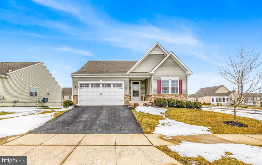 Welcome to 929 Robinson Rd, featuring the sought-after Bramante Cape Cod model by Ryan Homes—one of the largest floor plans in the community, offering over 3,350 square feet of living space. Ideally situated on a spacious corner lot, this home provides additional yard space and enhanced privacy.
Step inside to find beautiful wood flooring that flows from the foyer through the dining area and into the kitchen. To the right of the entrance is a generously sized bedroom with ample closet space and a full bathroom—perfect for guests or multigenerational living. Just beyond, a private enclosed office offers an ideal work-from-home setup.
The heart of the home showcases an open-concept living room and kitchen filled with natural light and enhanced by recessed lighting throughout. The expansive kitchen features tall cabinetry, granite countertops, a stylish backsplash, a pantry, and a large center island with seating for up to four. Adjacent to the kitchen is an enclosed porch—perfect for relaxing or enjoying casual outdoor seating year-round.
The main-level owner’s suite offers comfort and convenience, highlighted by a tray ceiling, ceiling fan, abundant lighting, and a spacious layout. The en-suite bathroom includes a double-sink vanity, walk-in shower, and a large walk-in closet. A dedicated laundry room completes the main-floor living space. To the left of the foyer, you’ll find a coat closet, access to the two-car garage, basement entry, and stairs leading to the second level.
Upstairs, a versatile loft provides flexible living space for a media room, hobby area, or additional lounge. This level also includes another bedroom, a full bathroom, and unfinished space that can be customized into an additional bedroom or storage area.
The partially finished basement expands the home’s functionality, featuring wood flooring, recessed lighting, a full bathroom, and additional unfinished space for storage or future finishing.
Outside, the generous yard offers plenty of room to enjoy outdoor activities or accommodate pets. The home is also pre-wired for a security system for added peace of mind.
Conveniently located just off Route 13, this property provides easy access to Delaware beaches, Route 301 to Maryland, Christiana Mall, and I-95. Golf enthusiasts will appreciate the close proximity to Odessa National Golf Club.
With reasonable HOA fees that cover community maintenance and a welcoming active-adult atmosphere, this home delivers the perfect blend of comfort, convenience, and lifestyle—an ideal setting for your next chapter.