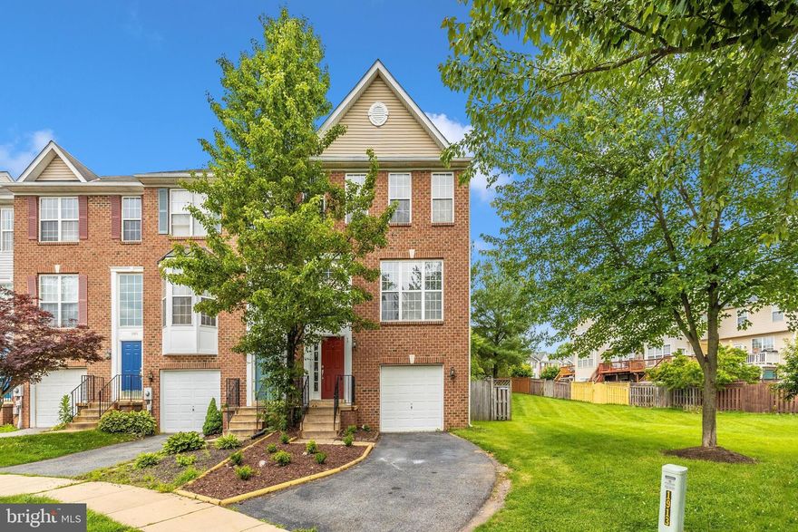 Welcome to this stunning brick-front end unit home situated on a spacious lot with tree-lined and open common area views. This impressive property spans three levels and includes sought-after features such as a morning room extension on all levels, newly painted walls, updated landscaping, and a freshly stained deck. The finished lower level offers a spacious L-shaped family room and a convenient half bath, providing abundant space for relaxation and entertainment. The main level features a large living area, dining room, and morning room extension. The luxurious master bath boasts custom tile, a separate shower, and a soaking tub, while cathedral ceilings and a generous walk-in closet add to the allure. Two additional bedrooms and a full bathroom with a new vanity complete the top level. The updated kitchen includes new wood flooring, 42-inch cabinets, and granite countertops, perfect for avid cooks. Step outside to enjoy the wrap-around deck and fenced rear and side yards, creating an ideal outdoor retreat. This home is not to be missed!