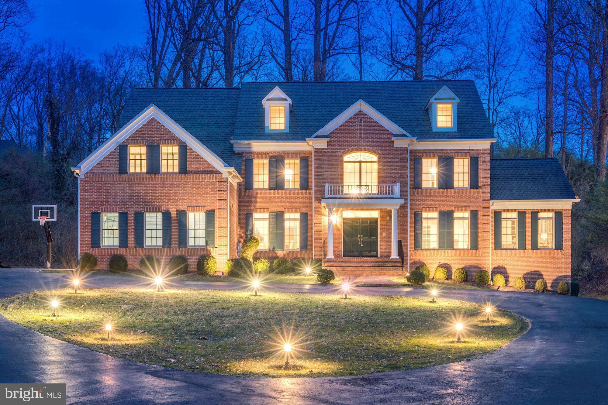 This stunning 6 BD/6.5BA boasts 7550 SF of finished space on 3 levels. The open floor plan is versatile with 2-story living room, gourmet kitchen w/granite countertops, & sunroom w/ surrounding windows. Master BR complete with dual sided FP, spa-like bath and 2 WIC. Lower level finished w/ 2 BR & BA's, expansive rec rm w/FP. Large deck with mature trees, ideally close to I-495 this house provides quick access to major commuter routes, shops, and restaurants.