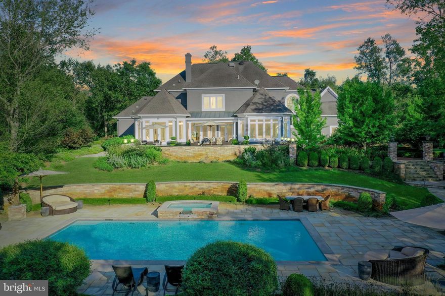 "La Terra," tucked away in the village of Philomont, is the perfect example of combining modern luxury with the charm that one would expect in a Hunt Country estate. Flanked by the Blue Ridge Mountains and Catoctin Mountain, tranquility awaits as you relax in your private outdoor oasis with year-round views of the Blue Ridge Mountains. Very rarely would you find an outdoor space that rivals "La Terra." No detail was left untouched, from the heated outdoor pool to the Viking appliance-equipt kitchen, expansive stone terrace, picturesque gardens, fountain water features, and koi pond. The interior of this home is equally impressive, with an extensive list of tasteful appointments at every turn. Newly refinished hardwood floors greet you upon entering, opening up to the grand foyer and dramatic contrasting staircase. Custom windows throughout the home bring in tons of natural light while providing the utmost energy efficiency. The heart of this home is the bright white chef-inspired kitchen, which lends itself to hosting large gatherings and being part of the conversation in the adjacent family room.  The stunning bathroom updates are guaranteed to catch your eye, as every single one has been fully remodeled. Also uniquely desirable is that all bedrooms are ensuites, each with its own bathroom and spacious closets. Finally, the basement area is anything but typical. The newly updated theatre room is bound to be a frequent hangout all year round. However, a separate rec room area awaits down the hall if you desire a more social setting. The three large bonus rooms could satisfy a host of opportunities, and although not official bedrooms, they have more than enough space to accommodate even the most discerning guests. There's much more to see that could only be appreciated in person. Schedule your private showing today.